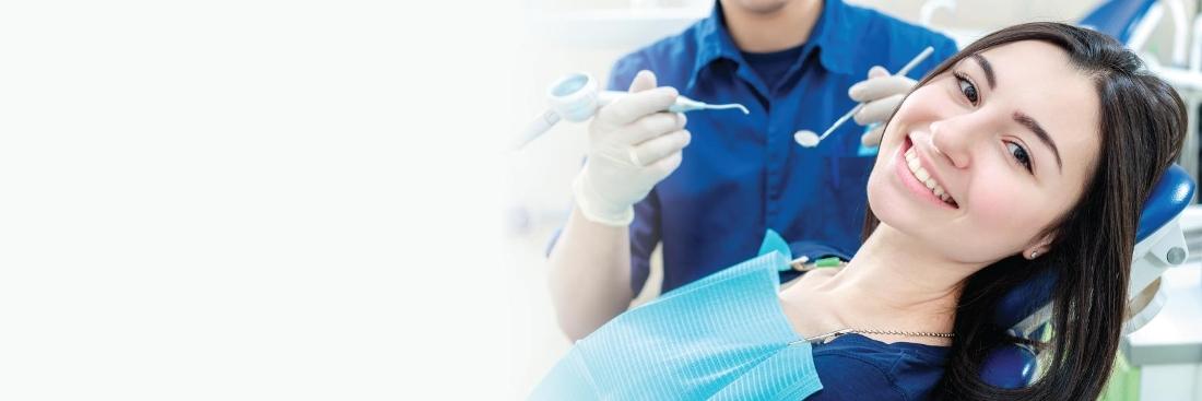 Woman smiling in dental chair | Chesterfield MO Dentist