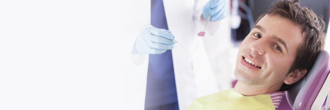 Man smiling in dental chair