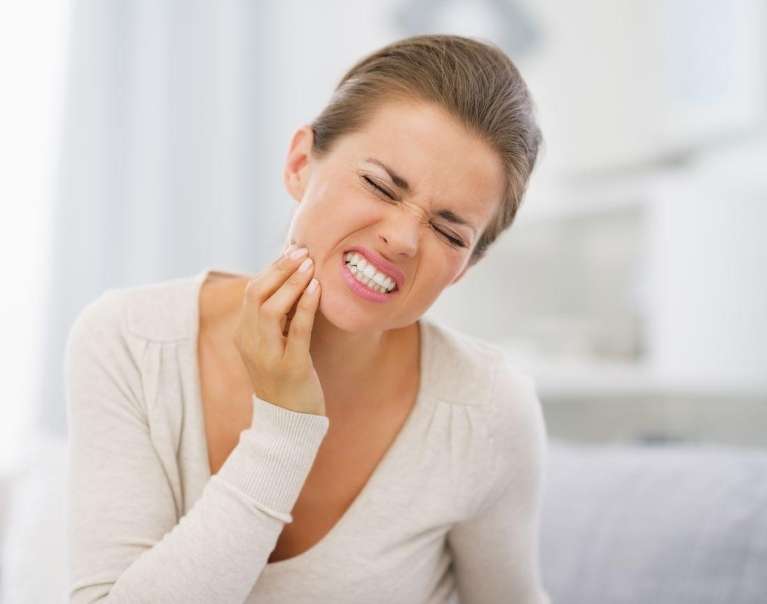 woman with jaw pain in Chesterfield MO