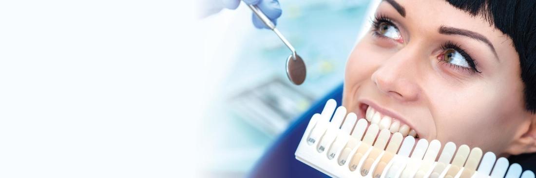 woman getting teeth whitened